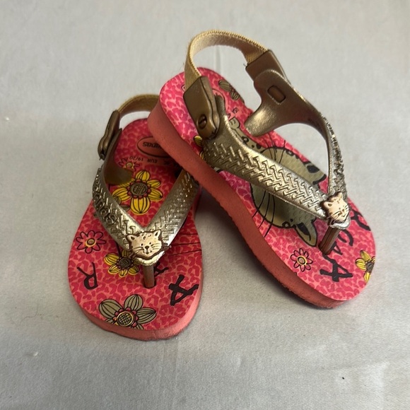 Havaianas Pink and Gold Flip Flops with Floral Pattern - Picture 1 of 5